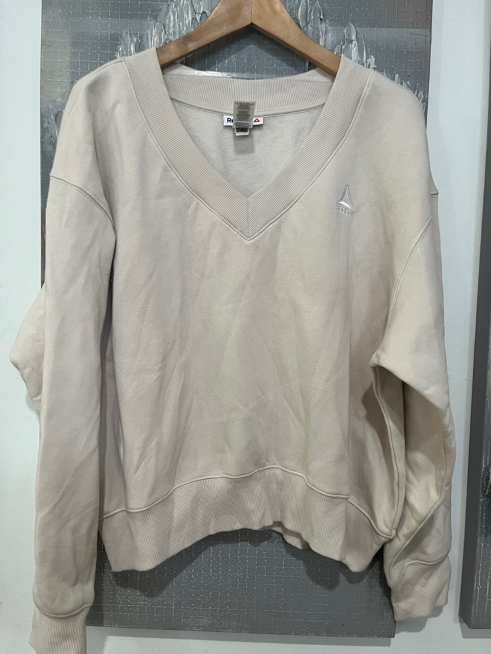 Reebok Women's V-Neck Sweatshirt in Light Beige